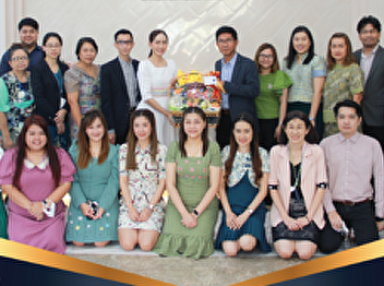 The Office of Academic Resources and
Information Technology give a birthday
fruit basket to Associate Professor Dr.
Luedech Kerdwichai, President of the
University Council.